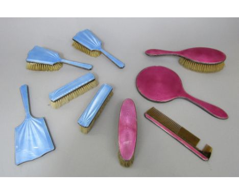 Five piece silver and sky blue guilloche enamel dressing set comprising four brushes and a mirror, maker H C D, Birmingham 19