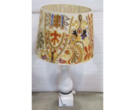 A large plaster table lamp of baluster form with massive 1970s hand painted shade