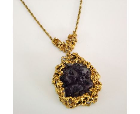 Vintage 9ct 1970s necklace by David Deakin with abstract pendant set with crystal amethyst within a naturalistic surround, si