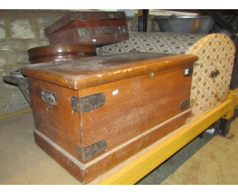 A 19th century pine blanket chest with steel banded borders and original grained finish, a Victorian tin hat box, two oval ga