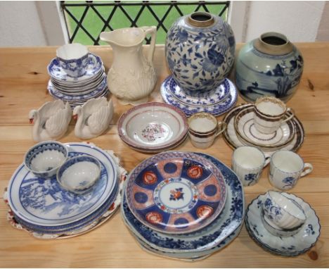 A collection of late 18th and later ceramics including an oriental jar with blue and white trailing floral detail, a further 