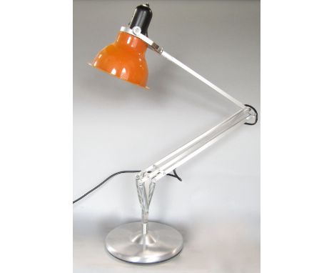 Modernist cast metal articulated lamp in the manner of anglepoise with orange shade
