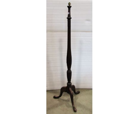 A mahogany lamp standard in the Georgian taste, the fluted column with wheatear and acanthus detailed decoration raised on a 