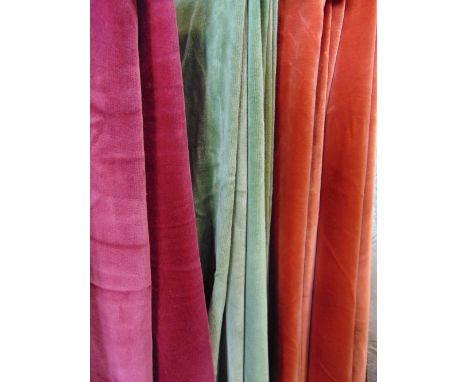 One pair and four single lined velvet curtains with pencil pleat heading, all with 2m drop, rust coloured pair have width 265