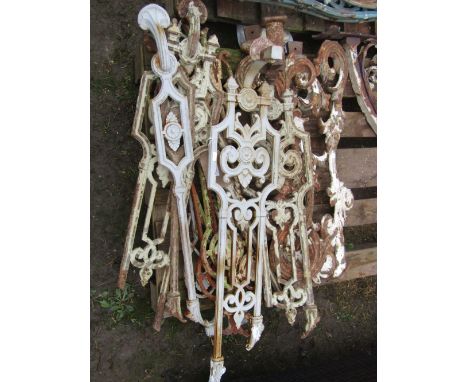 One lot of reclaimed cast iron railing support/sections of varying design with foliate and further detail and layers of paint