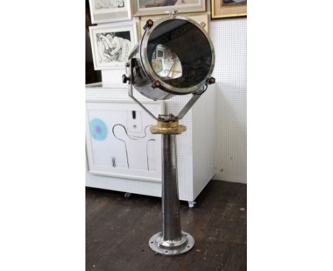 Floor standing search lights/lamp with polished steel casing and brass fittings, 110 cm high approx