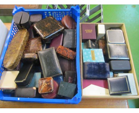 A blue tray and tray of jewellery boxes