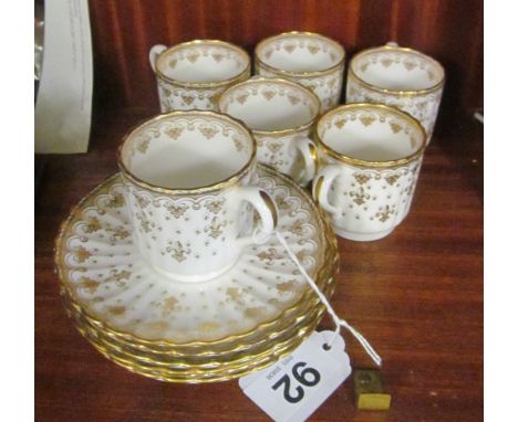 A set of six Spode Fleur de Lys coffee cups and saucers