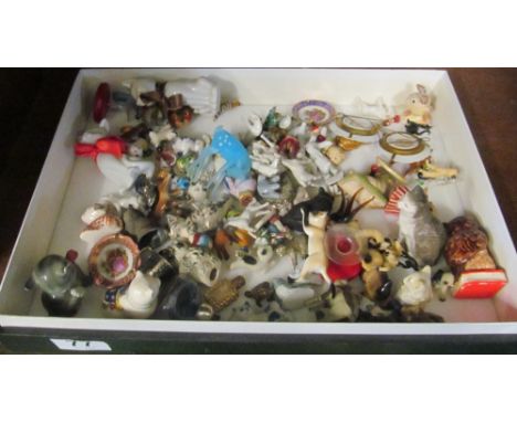 A group of glass and ceramic animals