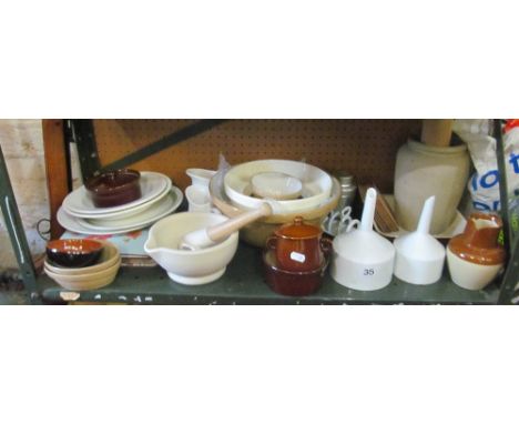Some kitchenware including pestle and mortar and a pair Royal Worcester funnels
