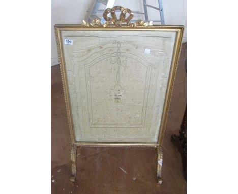 A gilt firescreen with needlework insert
