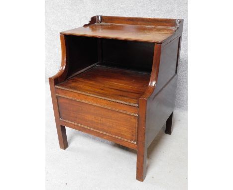 A Georgian mahogany night table with folding shelf and  panel enclosing compartment on square supports H.73 W.56 D.49cm 