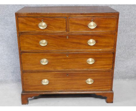 A Georgian mahogany chest of two short over three long drawers on bracket feet. H.99 W.110 D.50cm 