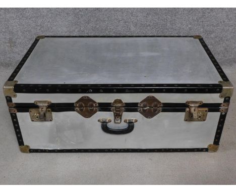 A contemporary aluminium traveling trunk. H.33 W.84 D.51cm 