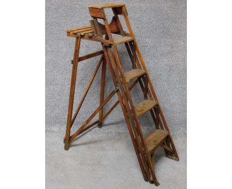 An vintage library step ladder with platform support. H.122cm 