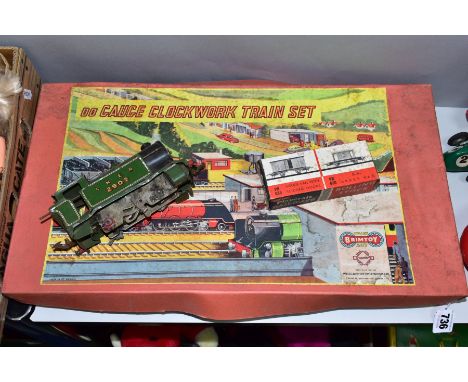 A BOXED BRIMTOY OO GAUGE TINPLATE CLOCKWORK TRAIN SET, No.4044, comprising streamlined 0-4-0 locomotive and tender, No.943057