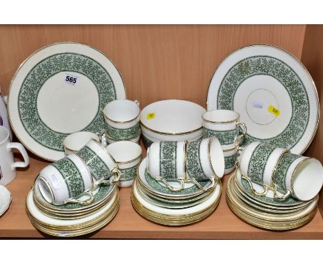 A LATE VICTORIAN CHINA TEA SET, possibly Wagstaff &amp; Brunt (W &amp; B) Rd No 70090, comprising two cake plates (hairline i