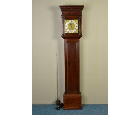 AN EARLY 18TH CENTURY OAK LONGCASE CLOCK, the hood with moulded pediment, arched glazed side panels, both cracked, the glazed