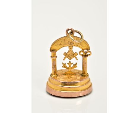 A 9CT GOLD MASONIC FOB, of oval design set with a carnelian base a Masonic symbol handle and jump ring, hallmarked 9ct gold B