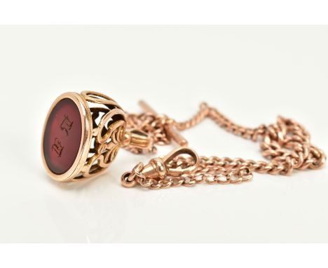 A ROSE GOLD ALBERT CHAIN WITH CARNELIAN INTAGLIO FOB, the yellow metal fob of oval design, set with an initial engraved carne