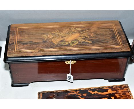 A LATE 19TH CENTURY ROSEWOOD, INLAID, EBONISED AND SIMULATED ROSEWOOD SWISS CYLINDER MUSIC BOX, playing eight airs, bears typ