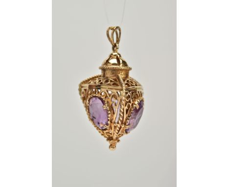 A 9CT GOLD AMETHYST LANTERN FOB, the openwork scroll detailed, lantern design fob, three sides each set with an oval cut amet