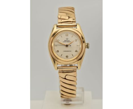 A GOLD GENTLEMAN'S ROLEX OYSTER PERPETUAL CHRONOMETER 'BUBBLE-BACK WRISTWATCH', circa 1947, model reference number 3131, seri