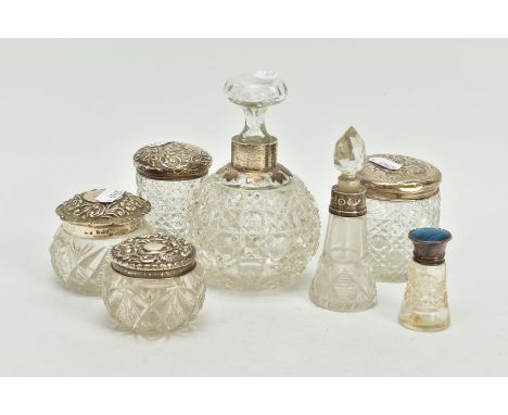 A SELECTION OF SILVER MOUNTED CUT GLASS DRESSING TABLE WEAR, to include seven pieces such as a round body solver mounted glas