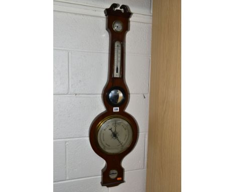 AN EARLY 19TH CENTURY ROSEWOOD CASED WHEEL BAROMETER, broken swan neck pediment, fitted with dry/damp dial, thermometer, conv