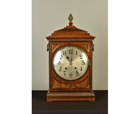 AN EARLY 20TH CENTURY MAHOGANY AND BRASS BANDED BRACKET CLOCK OF GEORGE III STYLE, silvered dial with Arabic numerals, eight 