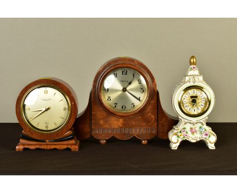 THREE 20TH CENTURY MANTEL CLOCKS, comprising a Dresden porcelain floral encrusted Jerger balloon shaped clock, height 18cm, a