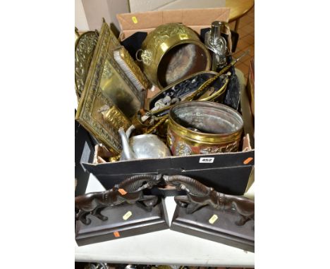 A BOX OF LOOSE METALWARES, to include a pair of cast horse shaped doorstops, brass fire irons, brass mirror/brushes, novelty 