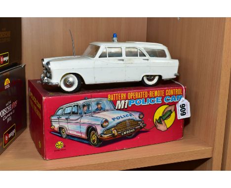 A BOXED MARX PLASTIC BATTERY OPERATED FORD ZEPHYR MKII FARNHAM ESTATE M1 MOTORWAY POLICE PATROL CAR, Empire (Hong Kong) made 