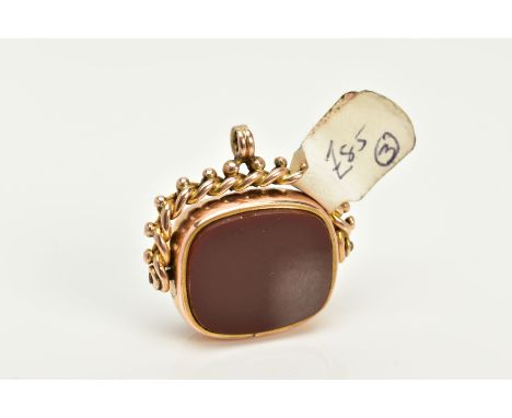 A 9CT GOLD SWIVEL FOB, of a rounded rectangular design, swivels to reveal bloodstone and carnelian panels within a collect mo