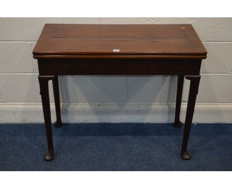 A GEORGE I/II MAHOGANY CONCERTINA CARD TABLE, the fold over top enclosing a green baize playing surface, shaped knees, on pad