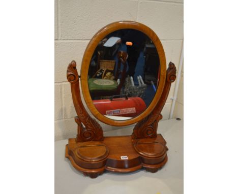 A LATE VICTORIAN WALNUT TOILET MIRROR