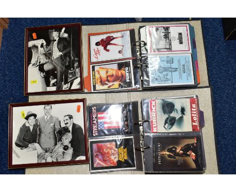 FILM POSTCARDS, a collection of approximately 320 feature film postcards in two albums, 210 produced in France by Editions 'H