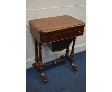 A LATE VICTORIAN MAHOGANY WORK TABLE, with a fold over top revealing a games board including chess and backgammon, single dra