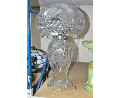 A MID 20TH CENTURY CUT GLASS TABLE LAMP, having a baluster shaped body and mushroom cap shade, chrome twin lamp fittings with
