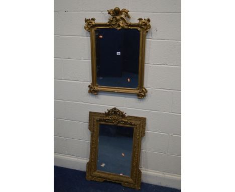 AN EARLY 19TH CENTURY FOLIATE GILT WOOD WALL MIRROR, 87cm x 61cm and a foliate gilt on plaster wall mirror 62cm x 82cm (sd) (
