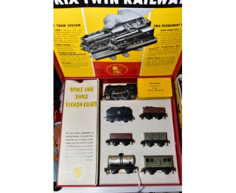 A BOXED TRIX TWIN RAILWAY SET, comprising freelance 0-4-0 locomotive and tender, No 31829, B R black livery (1/525), assorted