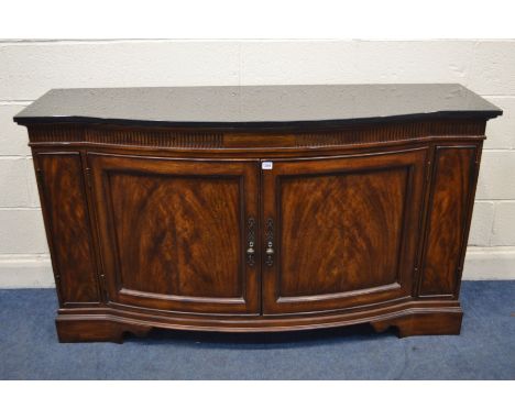 A REPRODUCTION MAHOGANY BOW FRONT SIDEBOARD, 'Fine Furniture' label attached, with an additional marble top, double panelled 