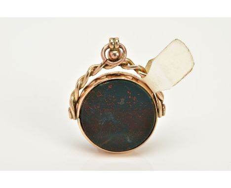 A 9CT GOLD SWIVEL FOB, of circular design, swivels to reveal bloodstone and carnelian panels, within a collet mount, hallmark