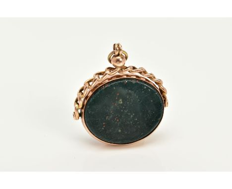 A 9CT GOLD SWIVEL FOB, of oval design swivels to reveal bloodstone and carnelian panels, within a collect mount, hallmarked 9