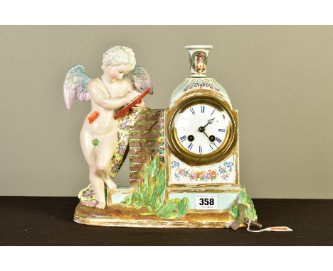 A LATE 19TH CENTURY CONTINENTAL PORCELAIN CASED MANTEL CLOCK, modelled as a cherub drawing beside a wall, the clock dial set 