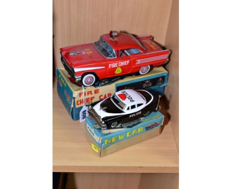 A BOXED ICHIKO (JAPAN) TINPLATE FRICTION DRIVE OLDSMOBILE FIRE CHIEF CAR, complete with moveable roof light and working siren