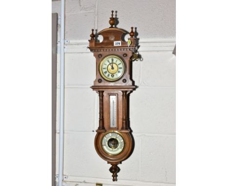 A LATE 19TH/EARLY 20TH CENTURY WALNUT CASED WALL HANGING CLOCK/BAROMETER, detachable pediment, enamel chapter ring with Roman