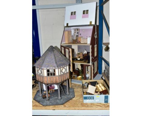 A WOODEN DOLLS HOUSE MODELLED AS A VICTORIAN CORNER SHOP, ground floor shop with a two storey flat above, a modern item which
