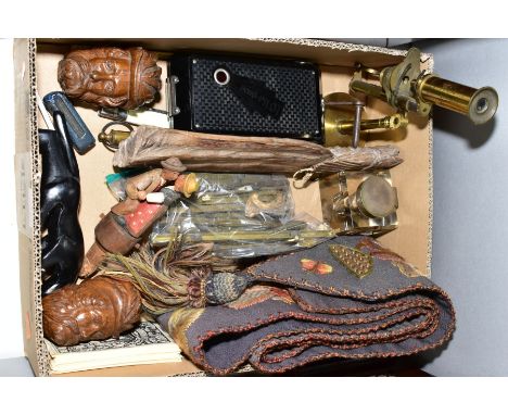 A BOX OF COLLECTABLES, TREEN, ETC, including a late 19th century brass monocular microscope, a 20th century crewel work bell 