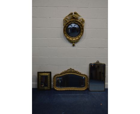 A REGRENCY STYLE GILT WOOD CONVEX WALL MIRROR, with an eagle pediment, together with a gilt wood foliate bevelled edge wall m